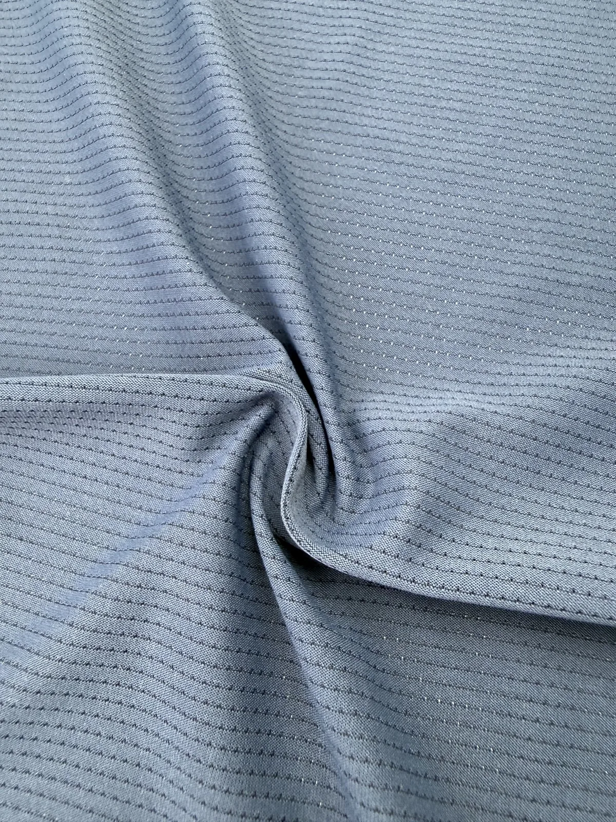 Detail sampel kain Bird Eye berwarna biru